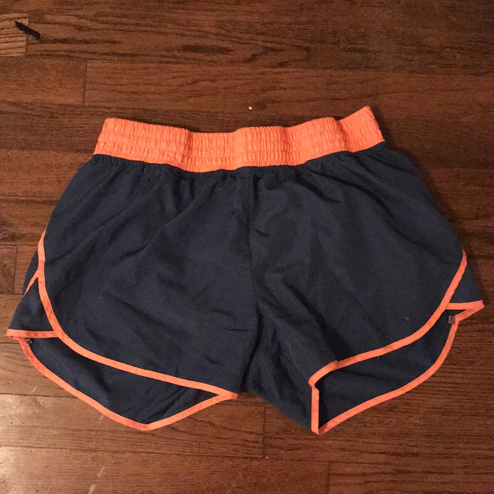 grey and orange athletic shorts
